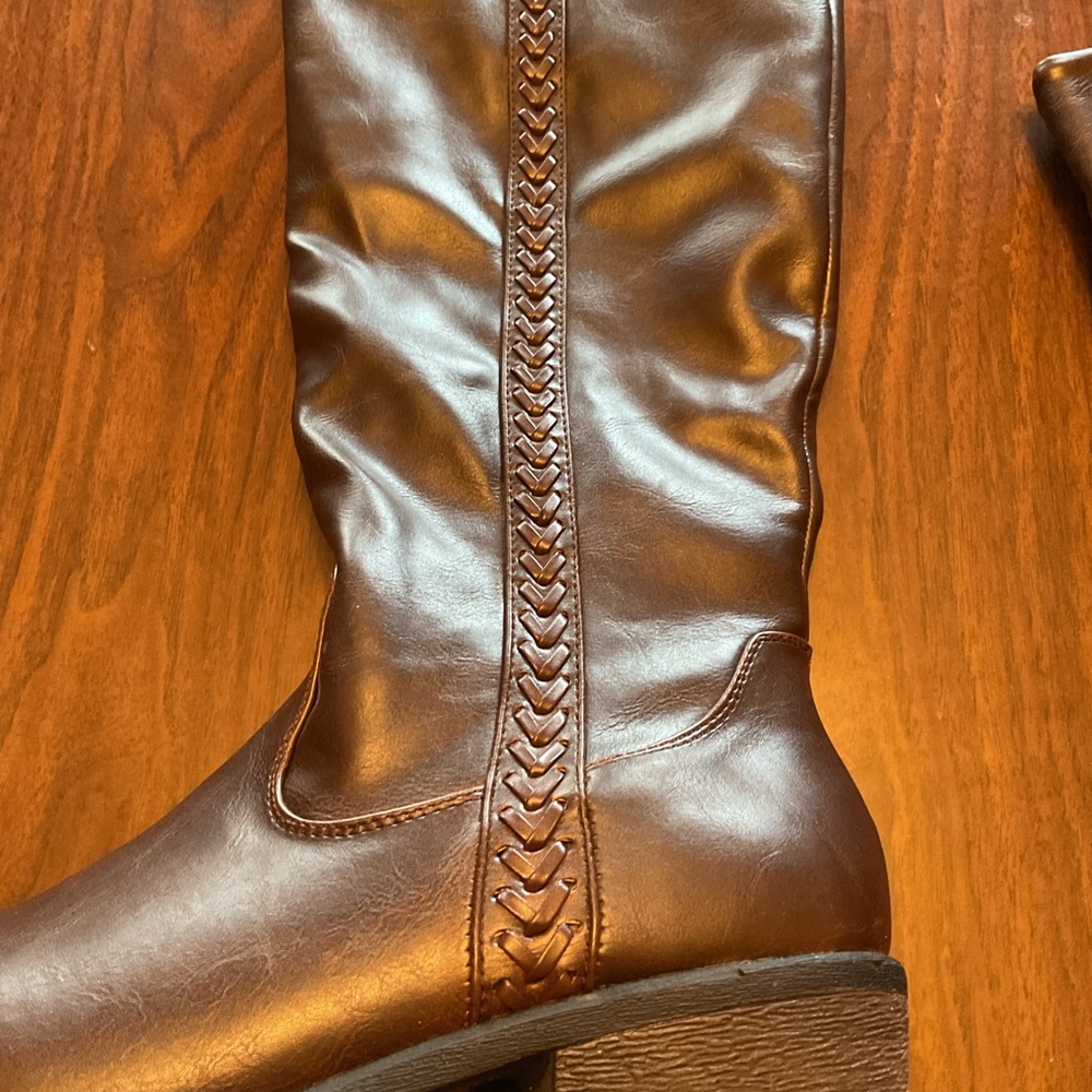 Brown wide calf dress boot with braid trim size 9.5.  Only worn twice